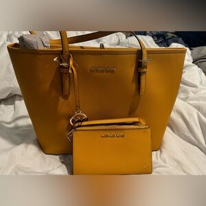 B brand New Michael Kors gold tote with Wallet